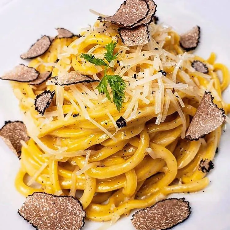 Potente signature dishes Spaghetti al TartufoFilet MignonSea Bass
